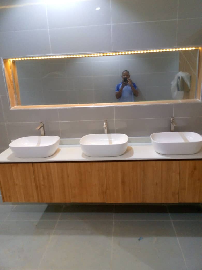 Vanity unit with three vessel basins installed by Soltom Plumbing in Abuja